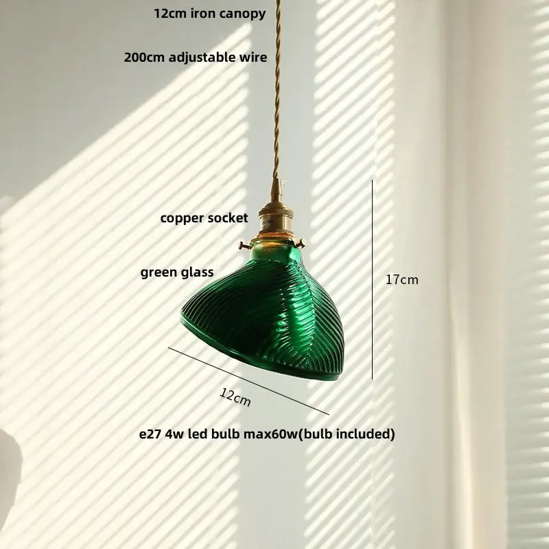 Vintage-style green glass pendant light with textured shade, copper canopy led, and iron fixture for dining room decorbites