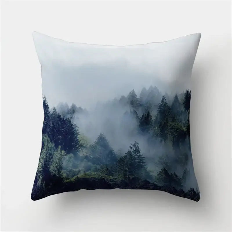Square throw pillow with green tropical leaves forest misty scene in deep greens and blues on soft fabric decorbites green tropical decor