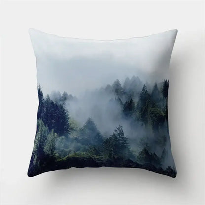 Square throw pillow with green tropical leaves forest misty scene in deep greens and blues on soft fabric decorbites green tropical decor