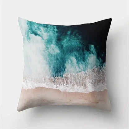 Square throw pillow with vibrant ocean wave design in deep teal and sandy tones for decorbites green tropical leaves forest decor