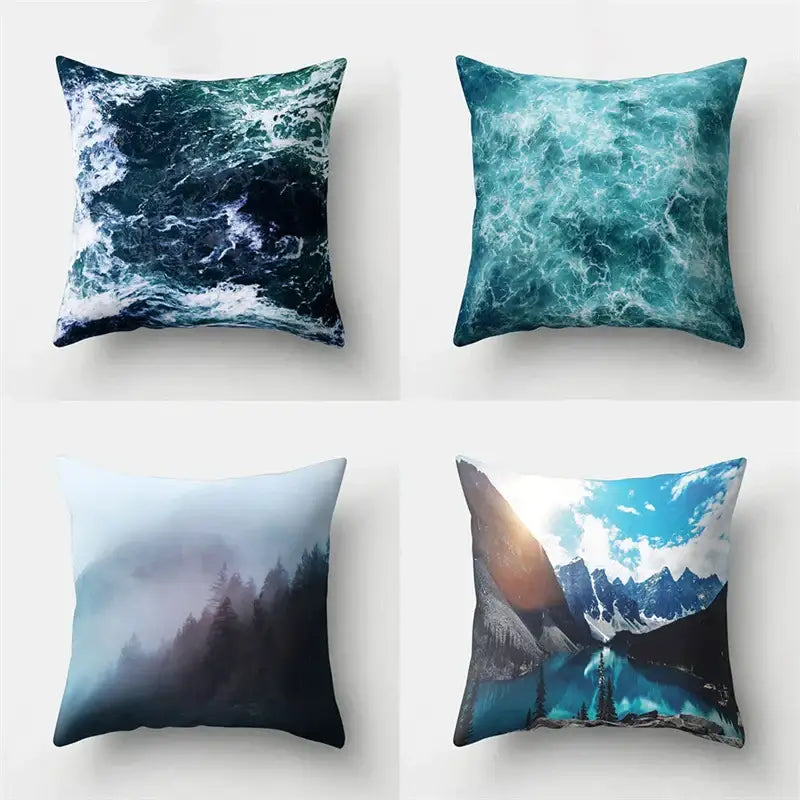 Four square throw pillows with decorbites green tropical leaves forest print in blue teal and white for living room decor