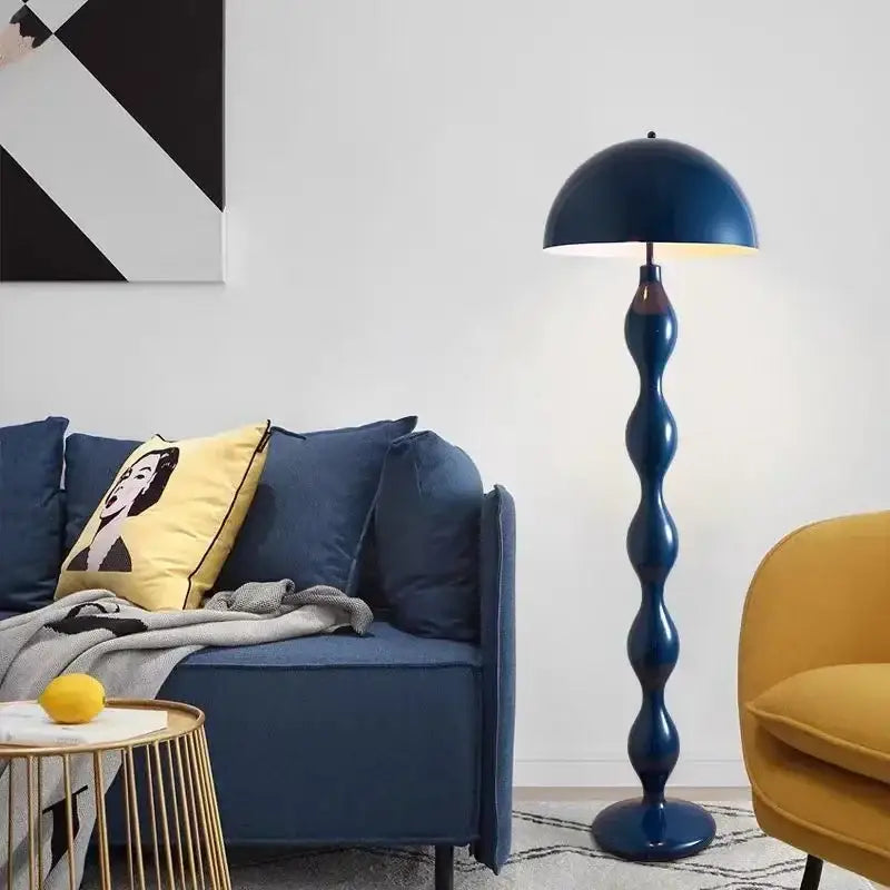 A sleek navy blue glossy floor lamp with an elegant twisted stem for decorbites circle mushroom floor lighting