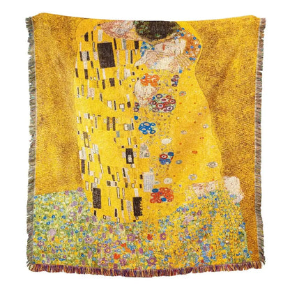 A vibrant yellow jacquard tapestry decorative throw featuring gustav klimt the kiss design with floral accents and fringe decorbites