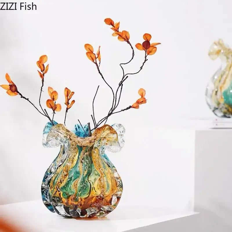 Hand blown glass vase with colorful flower edge in teal gold and amber hues for dining room decor