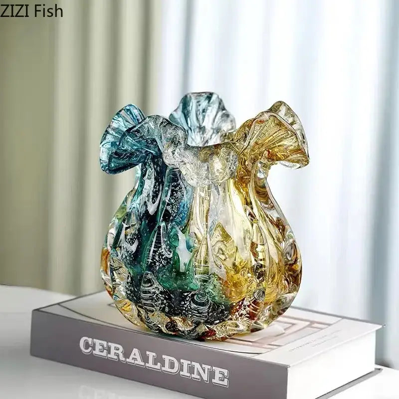 Hand blown glass vase with colorful flower edge in swirling blue and amber hues perfect for dining room decor