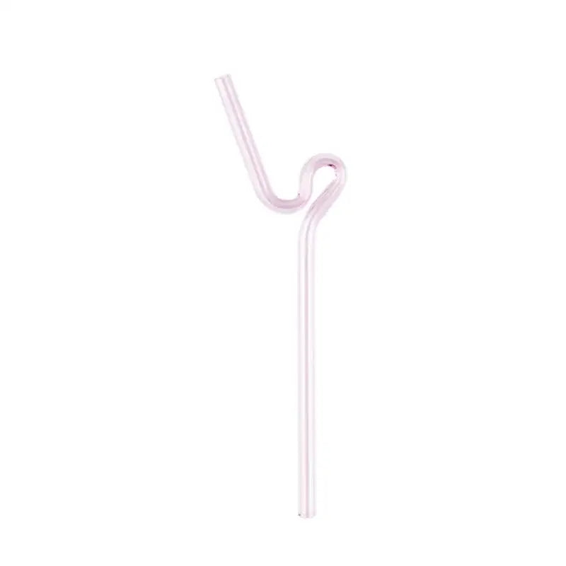 A translucent pink hand blown curved glass straw from decorbites glass straws kitchen drinkware set
