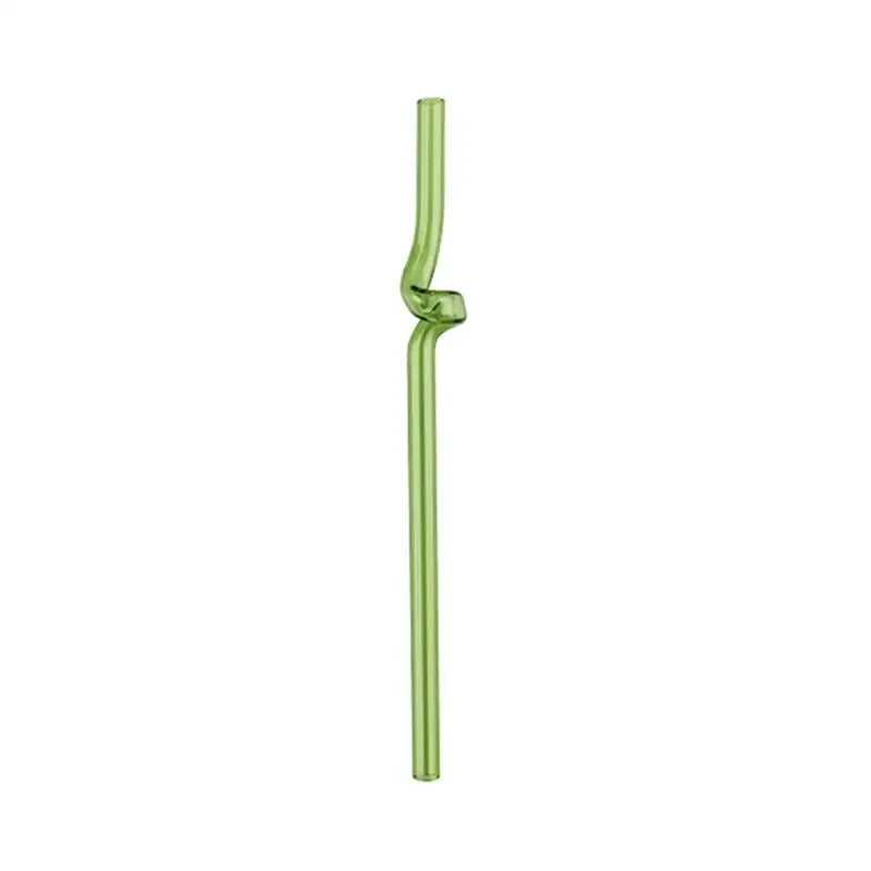 A translucent green hand blown glass straw with a twisted knot design from decorbites glass straws kitchen set
