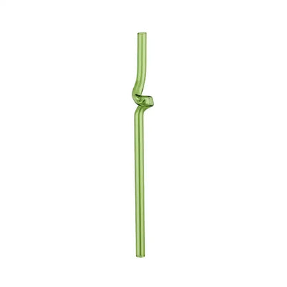 A translucent green hand blown glass straw with a twisted knot design from decorbites glass straws kitchen set