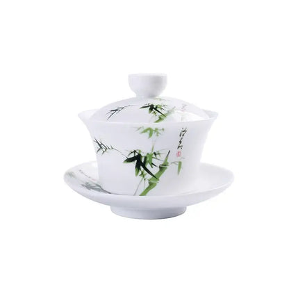 White porcelain gaiwan with hand-painted green bamboo and black ink brushwork and matching saucer by decorbites blue