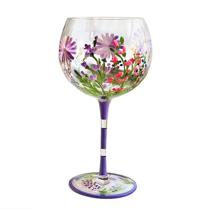 Hand-painted floral wine goblet with vibrant purple pink and green design on clear decorbites crystal glass bowl