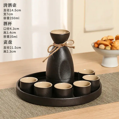 Handcrafted decorbites black ceramic wine warmer sake set with textured finish beige interior on circular tray with cups