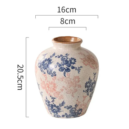 Handcrafted white ceramic vase with crackled cream glaze and blue pink floral patterns for living room decorbites decor