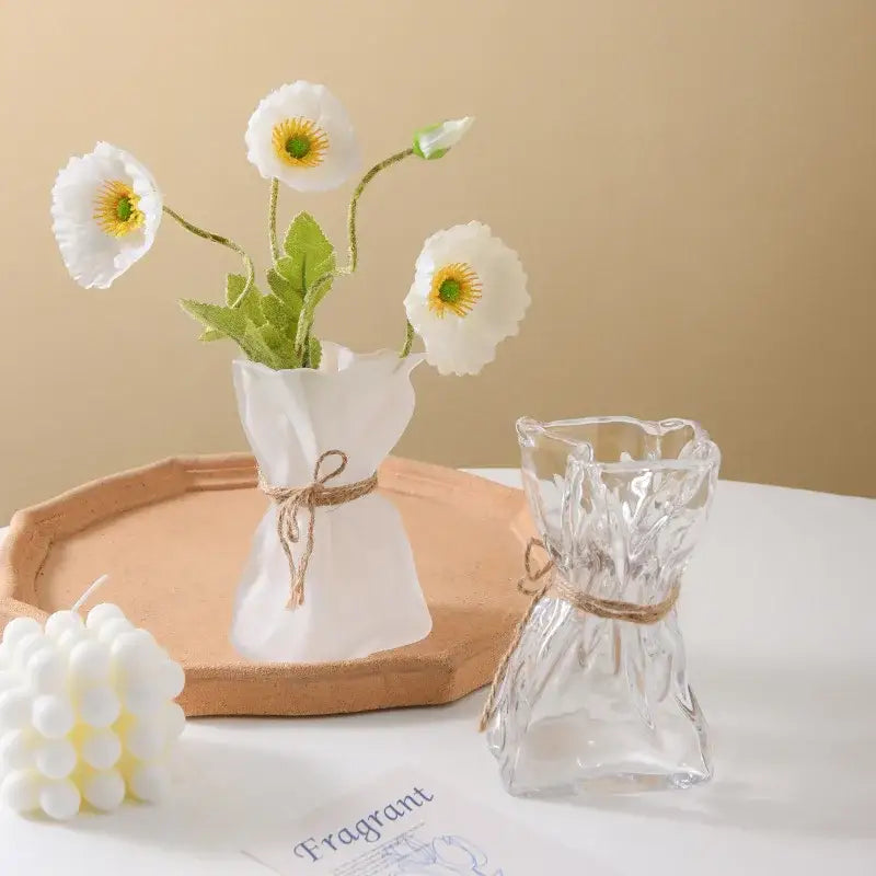 Handcrafted clear glass folded road vase with intricate cuts and ruffled rim tied with natural twine for decorbites clear glass decor