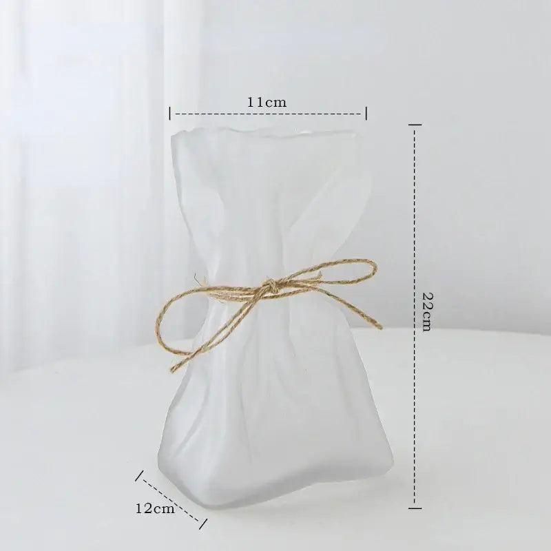 A translucent white frosted glass clear glass folded road vase with natural twine bow for living room decorbites clear glass decor