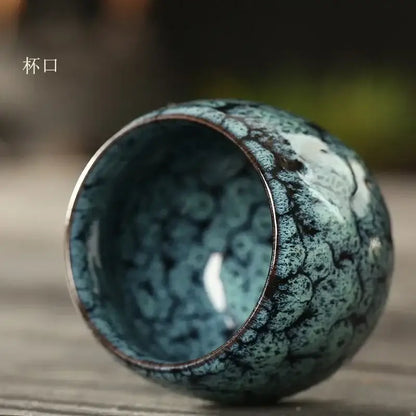 Handcrafted ceramic kung fu tea cup set with crackled teal and dark brown glaze featuring intricate moss-like pattern