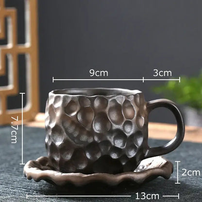 Dark gray handcrafted hammer pattern porcelain mug with textured surface and matching saucer kitchen set of 2