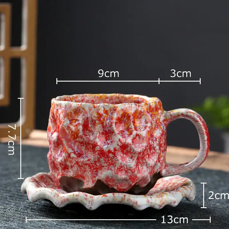 Handcrafted hammer pattern porcelain mugs set of 2 with vibrant red and white marbled glaze and textured surface