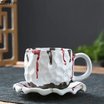 White ceramic hammer pattern porcelain mug with textured hammered surface and decorative red and brown drips in set of 2