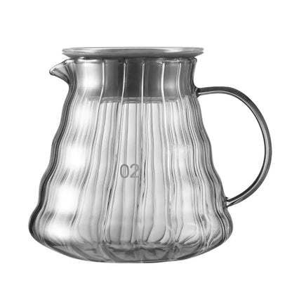 Clear glass coffee brewer with vertical ribbed texture and metallic handle from decorbites glass coffee set