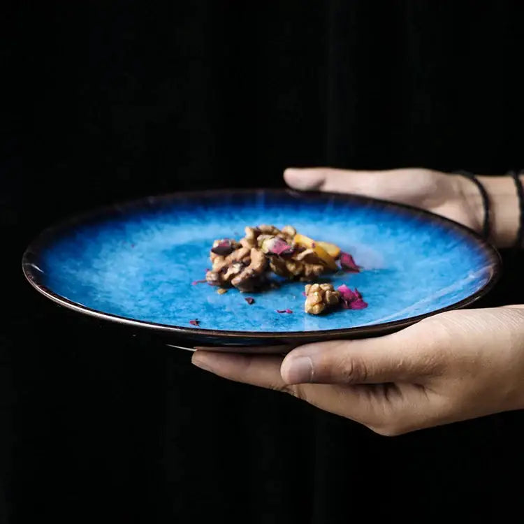 Vibrant blue handcrafted ceramic round plate with textured glazed surface and dark rim dining room set of 3