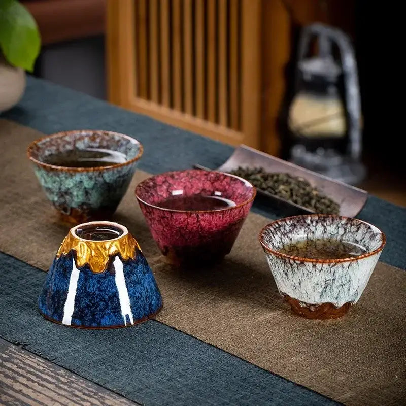 Handcrafted multicolored ceramic tea cup set with unique glazes and rustic crackled finishes for dining room use