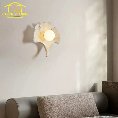 Handcrafted minimalist white ginkgo biloba resin wall lamp with frosted glass globe bulb for bedroom decorbites wall lamp