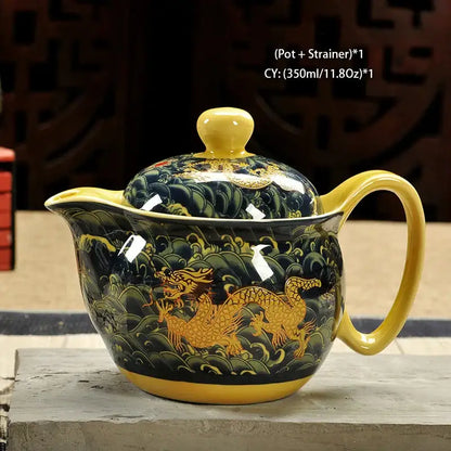 Glossy black ceramic kung fu teapot with golden dragon motifs and yellow accents by decorbites ceramic kung