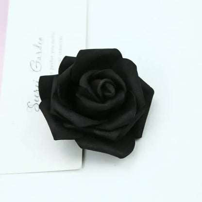 A black handmade foam roses flower brooch with layered petals and glossy finish for decorbites foam roses decor