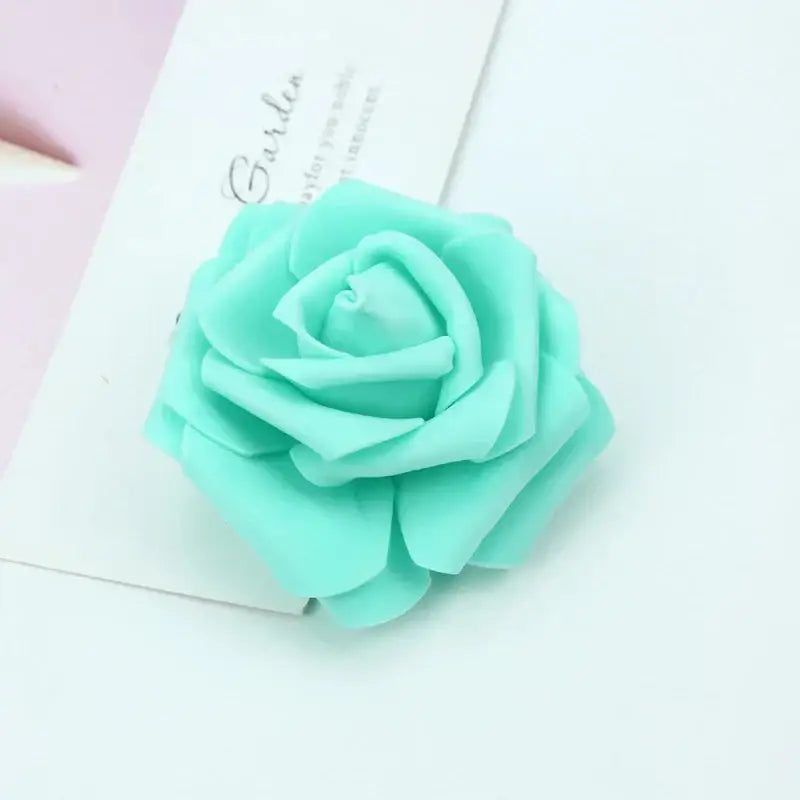 Handmade mint green foam roses flower with layered petals and soft texture for wedding decor by decorbites foam roses