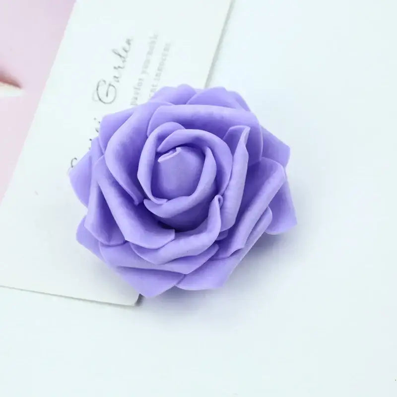 A delicate lavender handmade foam rose with layered petals for wedding decor by decorbites foam roses bouquet