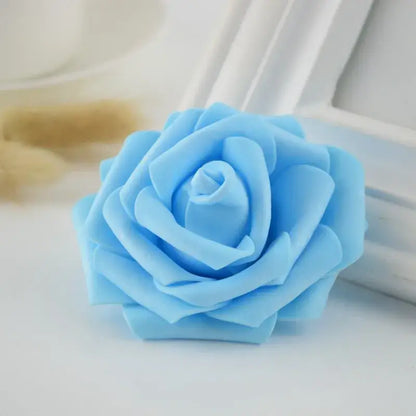 A delicate light blue handmade foam rose with soft layered petals for decorbites foam roses wedding decor