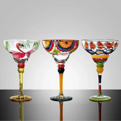 Three decorbites handmade colorful margarita glasses with vibrant painted designs and decorative stems for drinkware