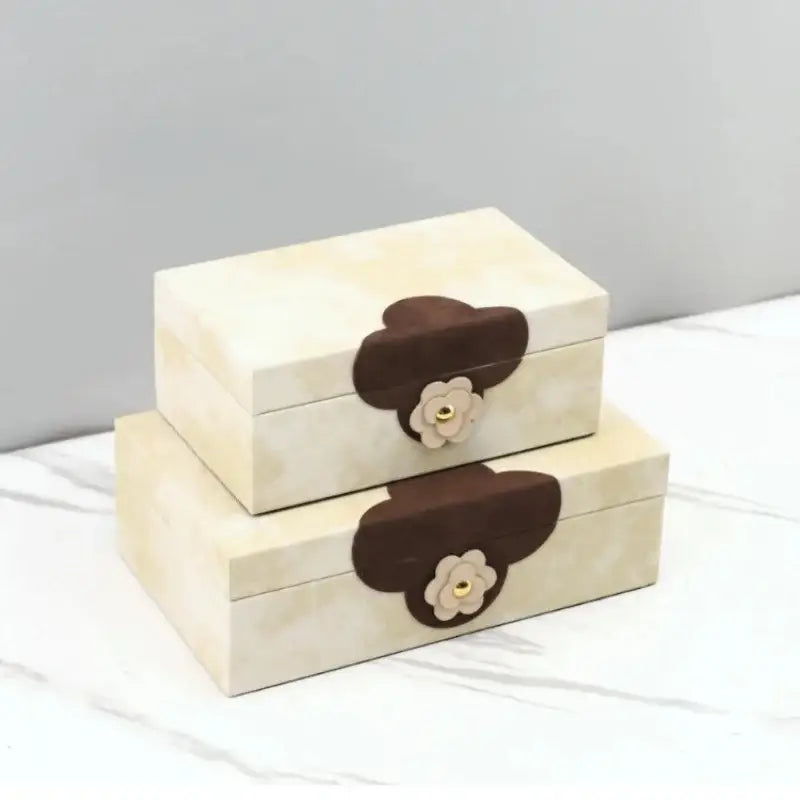 Cream-colored rectangular jewelry box with brown leather accents and decorbites handmade flowers for home decor