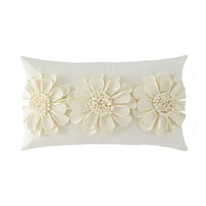 Cream-colored handmade flower cushion cover with 3D fabric and beadwork floral appliqués for living room decor