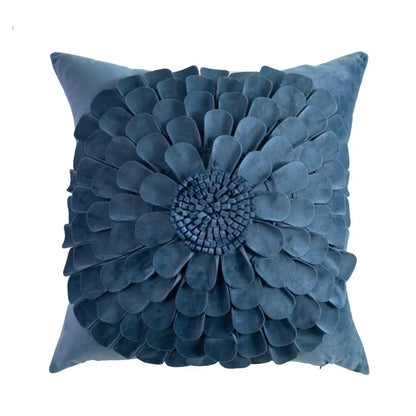 A plush navy blue velvet cushion cover with a handmade flower three-dimensional floral design for living room decorbites