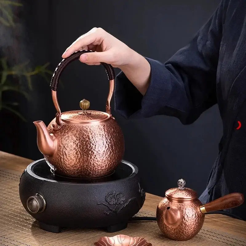 Handmade hammered copper tea pot with knitting handle decorbites handmade copper featuring brass lid knob and leather grip