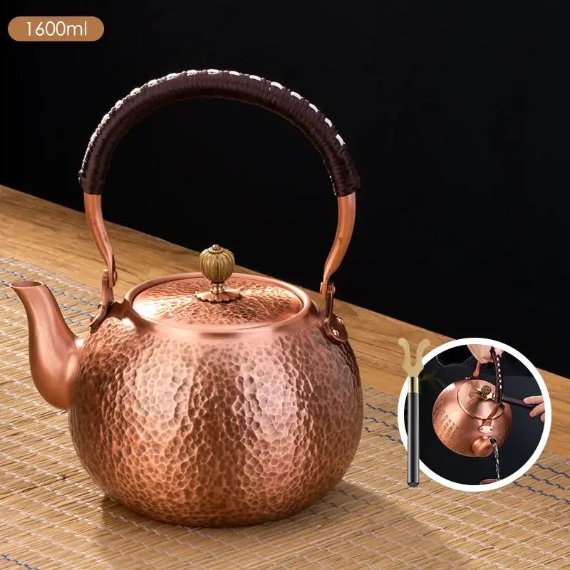 Handmade hammered copper tea pot with dark brown knitting handle and brass accents for dining room decorbites handmade copper