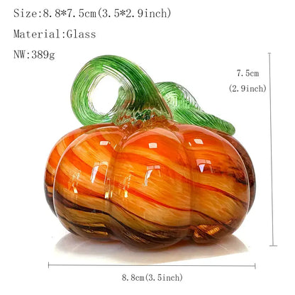 Handmade translucent orange and brown glass pumpkin figurine with green stem and swirling patterns for living room decor