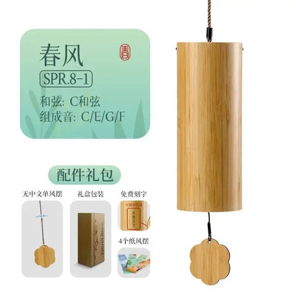 Handmade natural tan bamboo chord wind chimes with cylindrical body and flower-shaped wooden pendant for garden decor