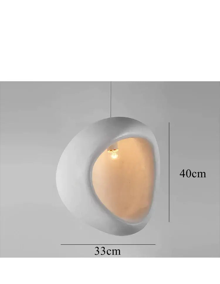 A handmade nordic designer matte white ceramic pendant light with an organic oval shape for dining room decorbites nordic chandelier
