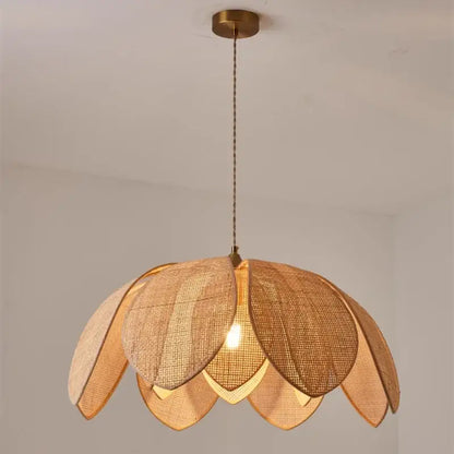 Handmade rattan petal pendant light with warm-toned woven rattan and brass ceiling mount for dining room decorbites pendant light