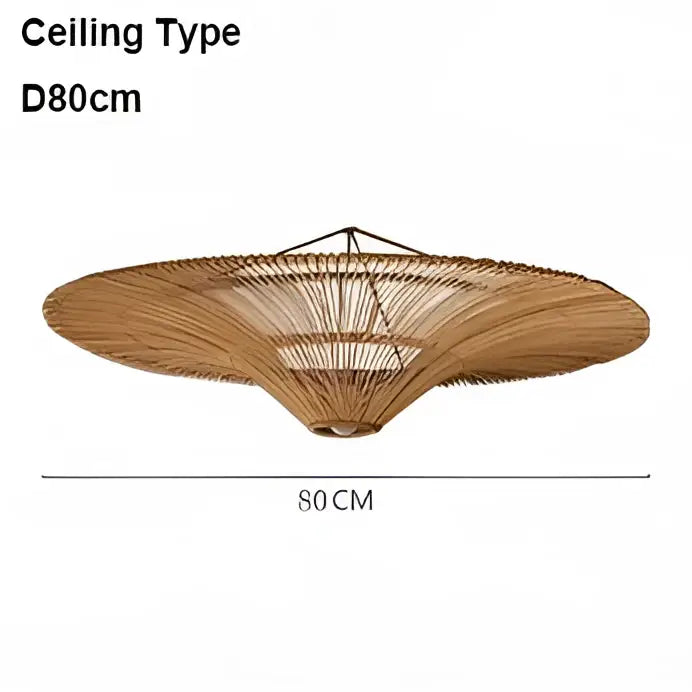 A wide circular ceiling fan with natural beige bamboo frame and woven rattan blades in handmade rattan wicker style