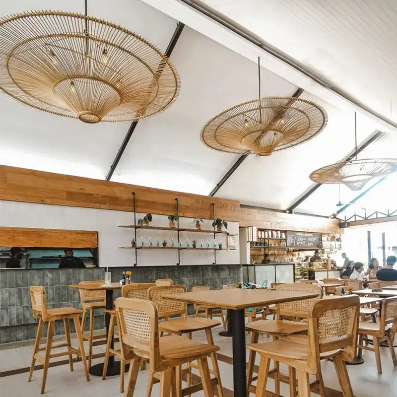 Woven bamboo pendant lights with circular fan-like design in natural beige handmade rattan wicker chandelier by decorbites
