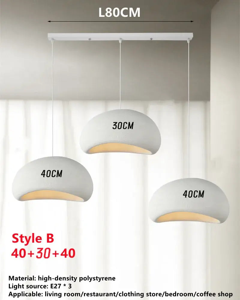 Modern minimalist handmade wabi sabi chandelier white trio pendant light in matte polystyrene with warm interior glow and labeled dimensions