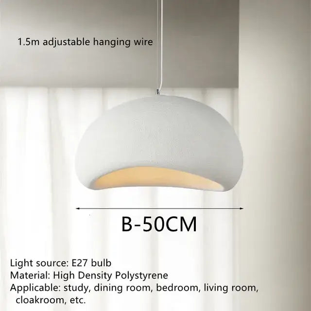 A modern white handmade wabi sabi chandelier dome pendant light with textured surface and warm glow for dining room decor