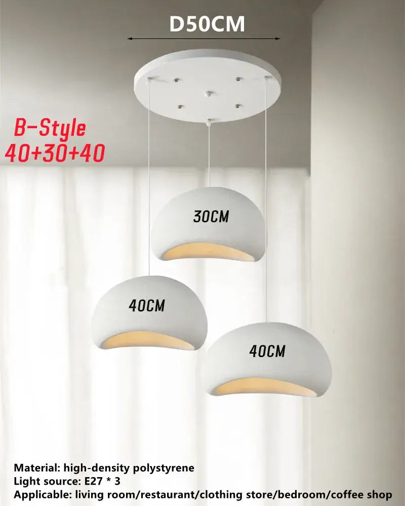 Modern white handmade wabi sabi chandelier with three polystyrene dome shades featuring warm interior glow for dining room decorbites handmade wabi