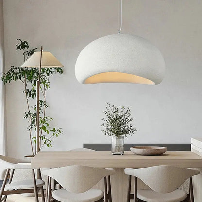 Handmade wabi sabi off white pendant lamp with textured curved dome and warm interior glow for dining room lighting decorbites handmade wabi