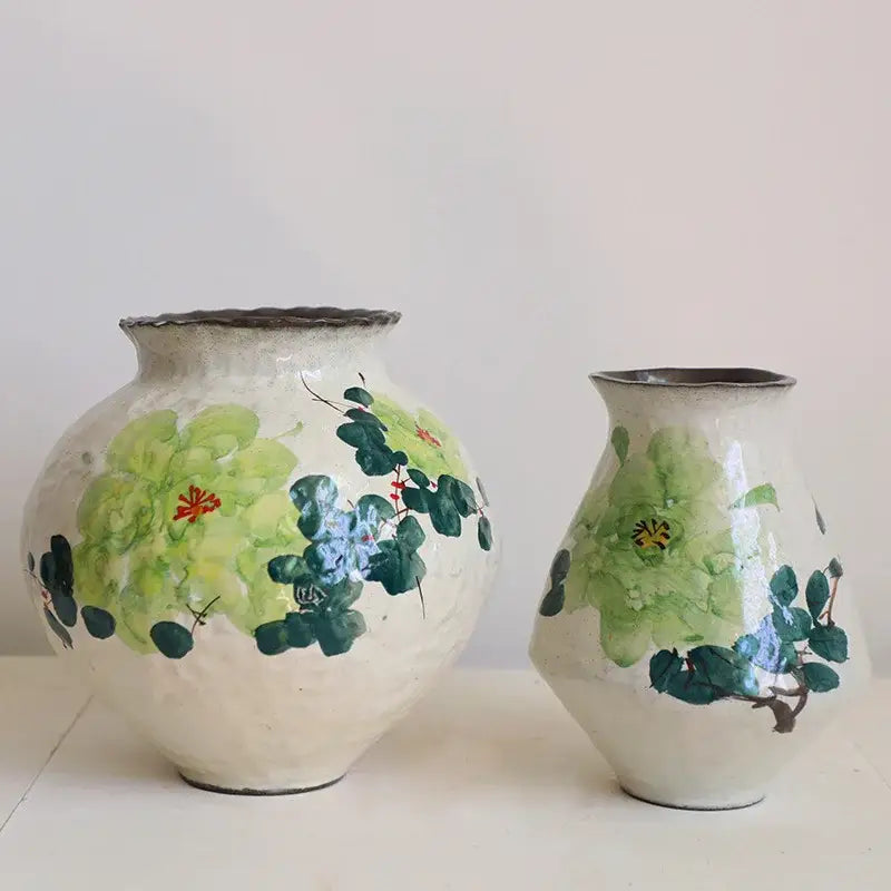 Two hand-painted ceramic flower vase retro with textured off-white glaze and watercolor floral designs in green blue and red