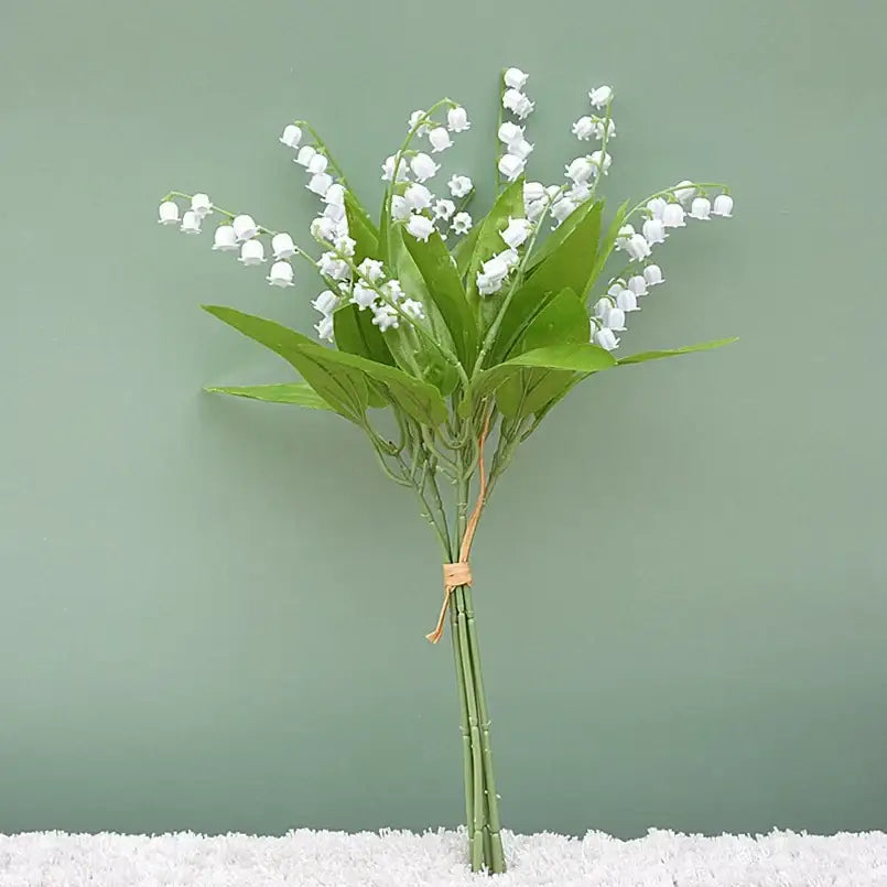 Handmade white bellflower artificial flowers bouquet with delicate lily-of-the-valley blooms for wedding decor by decorbites