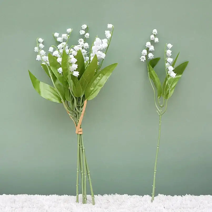 Handmade white bellflower artificial flowers bouquet with delicate blossoms and glossy leaves for wedding decor by decorbites
